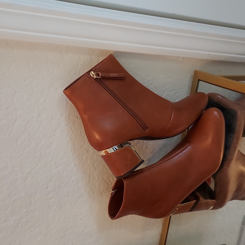 DKNY Ankle boots in cognac color with gold tone trim on heels.  New with tag.